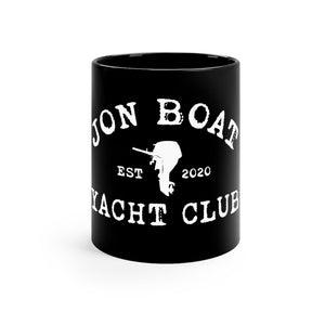 Black 11oz ceramic mug with "JON BOAT YACHT CLUB EST 2020" and an outboard motor design in white.