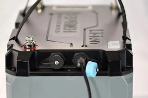 Gray and black Epoch 24V 100AH LiFePO4 marine battery with terminals, ports, and carry straps.