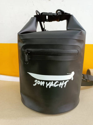 Black 5L Jon Yacht dry bag with roll-top buckle closure, front zipper pocket, and white logo.