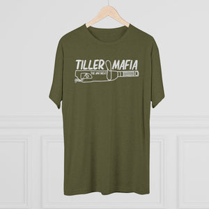 Olive green "Tiller Mafia" tri-blend tee with white graphic design, hanging on a wooden hanger.