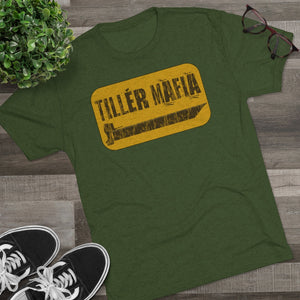Green CAMO Tiller Mafia Tee with a yellow distressed graphic featuring a tiller blade and text.