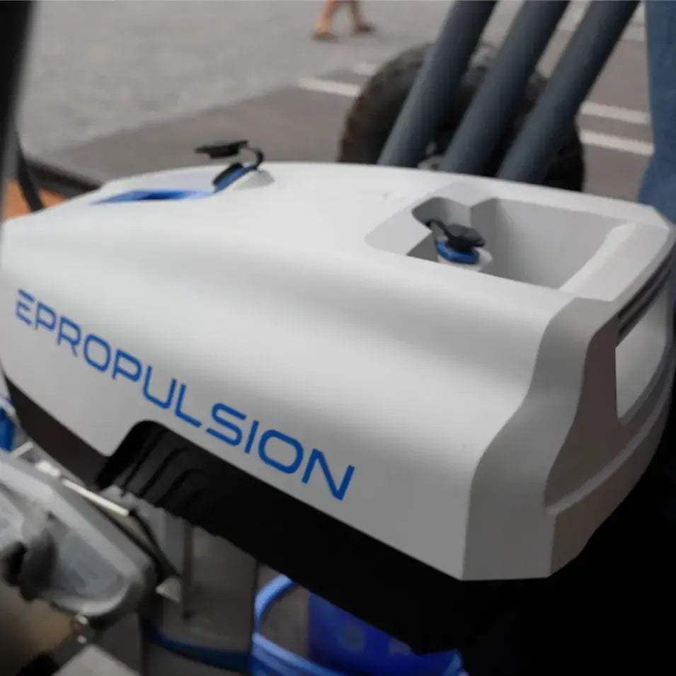 Close-up of an EPropulsion Spirit 1.0 Plus electric outboard motor featuring the word "epropulsion" prominently displayed.