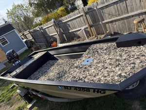 Hydro Turf Cut Groove EVA foam traction mat in TBNation Camo installed on a Jon Boat deck.