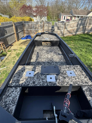 Hydro Turf Cut Groove EVA foam traction mat in TBNation Camo installed in a black jon boat.