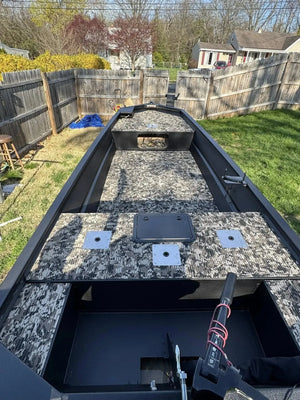 Hydro Turf Cut Groove EVA foam traction mat in TBNation Camo installed in a black jon boat.
