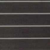 Dark gray HydroTurf EVA foam decking sheet with light gray routed lines, showing the two-tone material.