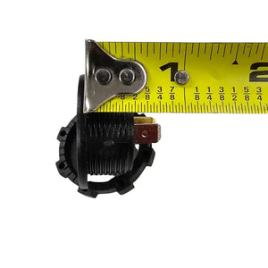 Black, round LED voltmeter with two terminals, measured by a yellow tape measure.