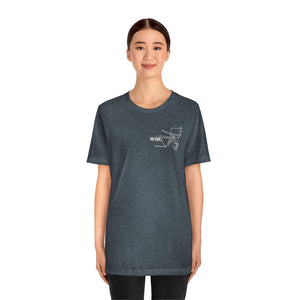 Woman wearing a charcoal gray cotton tee with a white MERC Tiller outboard motor graphic.