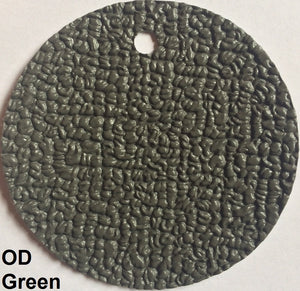 Round OD Green MariDeck marine vinyl flooring sample with a textured, slip-resistant surface.