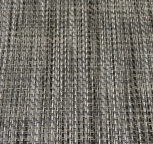 Close-up of MariDeck Ultra Premium vinyl boat flooring with a woven texture in shades of tan and black.