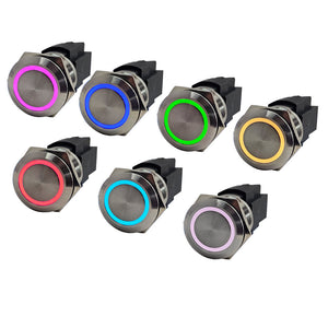 Seven stainless steel marine push button switches with RGB LED backlit rings in various colors.