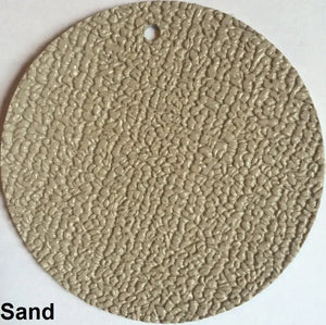 Round sample of MarineDeck 80 mil marine vinyl flooring in Sand, featuring a textured, slip-resistant surface.