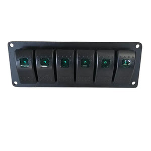 Black solid aluminum mini switch panel with six green lighted rocker switches.