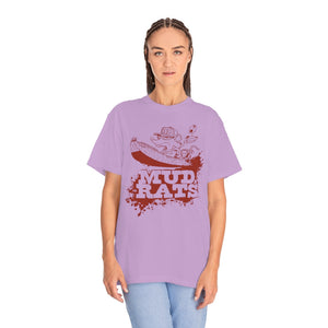 Woman wearing a relaxed-fit, garment-dyed lavender Mud Rats t-shirt with a red graphic of a rat in a boat.