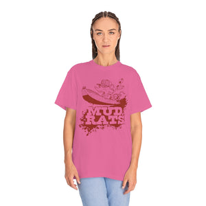 Woman wearing a pink Gildan Mud Rats t-shirt with a cartoon rat in a boat and brown text.