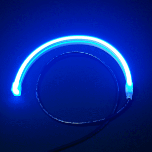 Curved blue LED neon flex strip with black power wire for Mercury 450 outboard cowling.