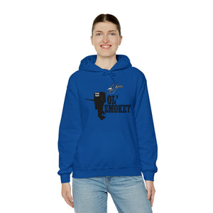 Woman in blue Ol' Smokey Hoodie with 2-stroke engine graphic.