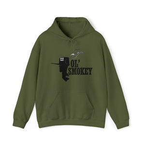 Olive green Ol' Smokey Hoodie with a black outboard motor graphic emitting smoke.