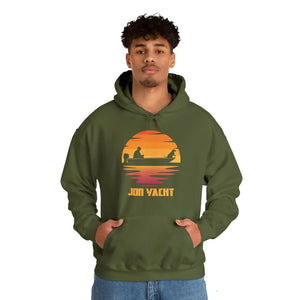 Man wearing an olive green hoodie with a sunset graphic featuring a boat and "JON YACHT" text.
