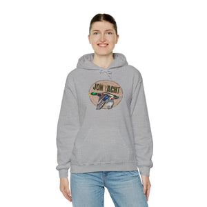 Woman wearing a gray cotton-polyester hoodie with a "JON YACHT" logo and a flying duck graphic.