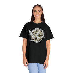 Woman wearing a black Comfort Colors t-shirt with a "Jon Yacht Outfitters" duck design on a leopard print background.