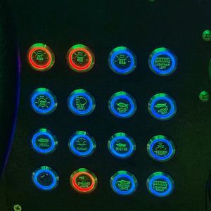 Plashlights REVERT 22mm marine switches with blue and red LED rings, custom labels, on a dark panel.