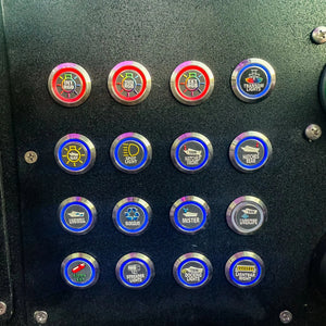 Plashlights REVERT 22mm marine switches with custom labels, blue and red LED rings, on a black panel.