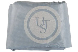 Light blue ripstop nylon dry bag with a reflective circular Sea Eagle logo.