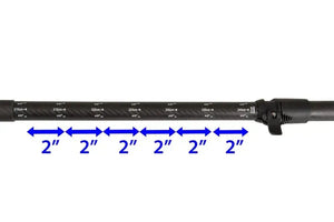 Black carbon-fiberglass paddle shaft with white measurement markings and a lever lock mechanism.