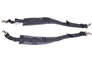 Black adjustable multipurpose thigh straps with padded foam and metal snap hooks.