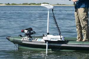 Green Sea Eagle inflatable Fish Skiff with a white Minn Kota bow motormount and electric motor.