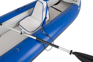 Black Sea Eagle paddle leash with a gold clip attached to a silver paddle on a blue inflatable kayak.