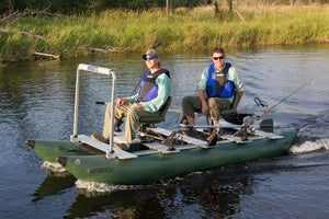 Two men fishing from a green Sea Eagle FoldCat pontoon boat with a 7" pedestal seat.