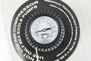 Black Sea Eagle pressure gauge with white face, red and black psi markings, and "Bravo" logo.
