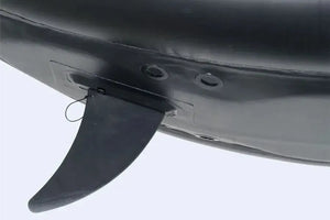 Black Sea Eagle skeg base attached to an inflatable kayak or SUP, showing the fin and mounting holes.