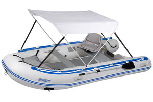 White Sea Eagle Wide Sun & Rain Canopy on an inflatable boat with blue trim and gray seat.
