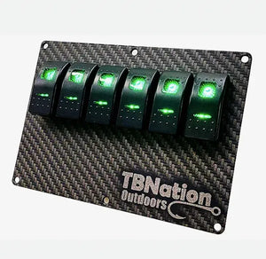 TBNation 6-gang rocker switch panel with carbon fiber hydro-dipped aluminum plate and green LED switches.
