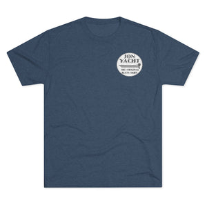 Heather navy blue soft cotton t-shirt with a white "Iron Yacht The Original Flats Skiff" logo on the left chest.