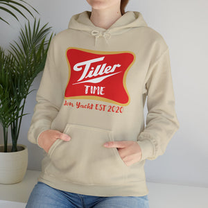 Beige "Tiller Time" hoodie with red and gold graphic, kangaroo pocket, and drawstring hood.