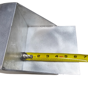 Raw aluminum universal clamp-on trolling motor mount with a tape measure showing its 6-inch width.