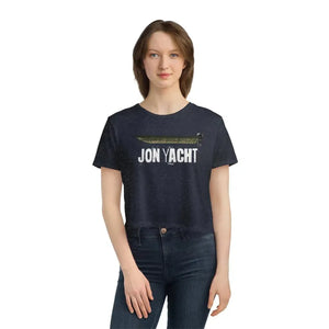 Woman wearing a navy blue flowy cropped tee with "JON YACHT" text and a boat graphic.