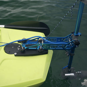 Kayak with a blue motor attached to the back, floating on water.