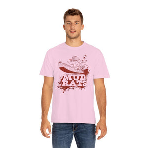 A man wearing a light pink crewneck t-shirt with a distressed red graphic that reads 'MUD RATS' and shows a cartoon rat in a boat, paired with blue jeans, against a plain white background.