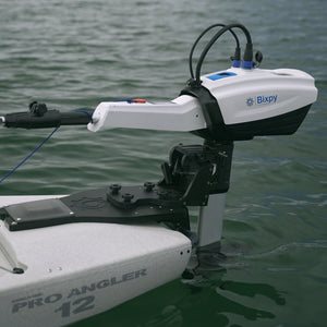 Bixpy outboard motor attached to a Pro Angler kayak on water