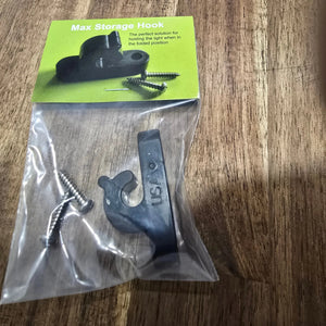 Max Storage Hook accessory included with the Max It Out LEDs Premier Universal LED Stern Light Kit, containing a black rubber retention clip and two mounting screws in clear packaging.