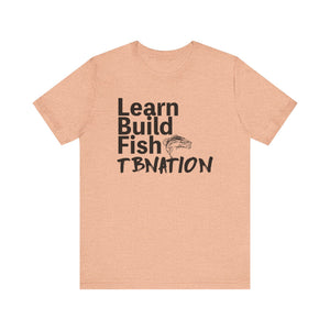 Beige t-shirt with text 'Learn Build Fish TBNATION' on a white background