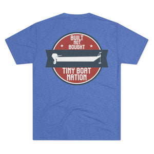 Blue t-shirt with a graphic design on the back featuring text and a boat illustration.