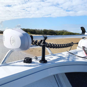 White RAILBLAZA StarPort Base mounted on a boat, securing a trolling motor with a black coiled cable.