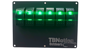 Black TBNation 6-gang hydro-dipped aluminum switch panel with six illuminated green rocker switches.