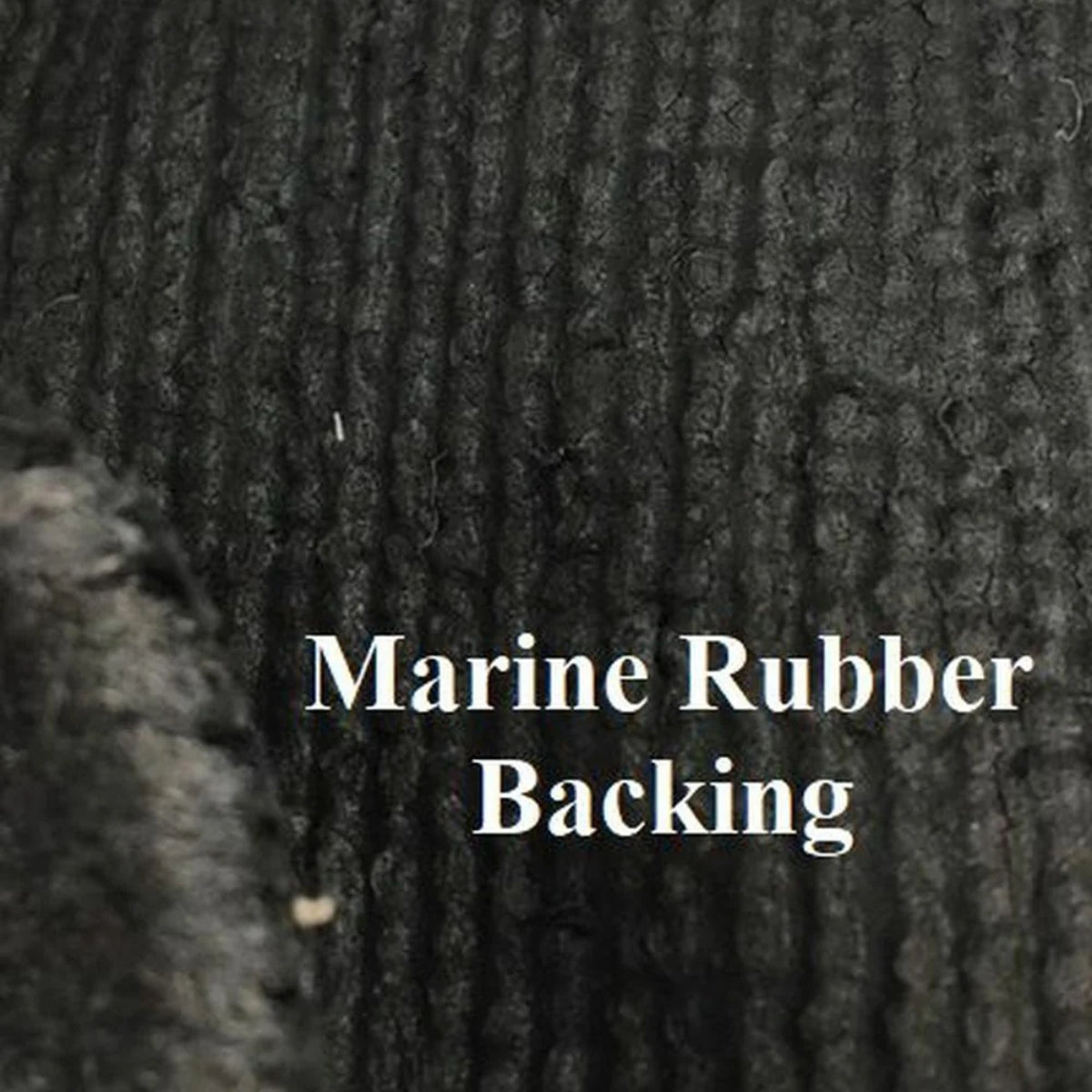 Close-up of black marine rubber backing for 16 oz. cut pile boat carpet.
